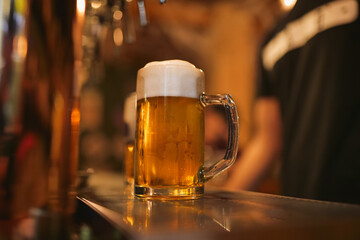 Fototapeta na wymiar cold beer in a pub spill 