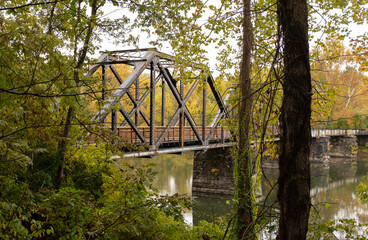 Fall scene of rail bridge.