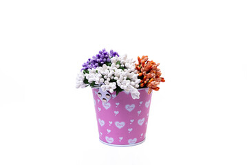 aluminum ice bucket laid in wait for use. stainless multi-colored bucket with green blue flowers