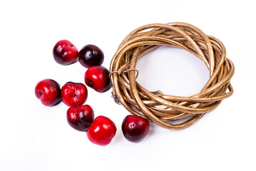 Wreath woven from the branches of the vine isolated , Place for text