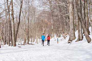Couple jogging in winter morning