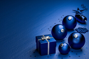 Classic Blue Christmas decoration on a blue stone background