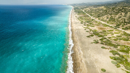 Fototapeta na wymiar Clear water by the beach in Rhodes near Lindos, Greece