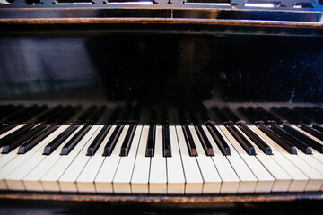 Fototapeta na wymiar Old vintage piano keyboard, close up