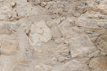 ancient stone wall texture background in horizontal view