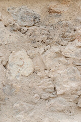 ancient stone wall texture background in vertical view