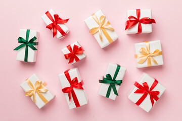 Gift boxes on color background, top view