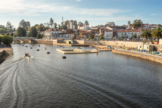 City of &Aacute;gueda in Portugal, view over the river &Aacute;gueda with the houses in the background, on a summer afternoon.