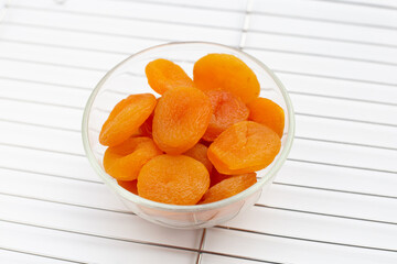 Dried apricots on white background.