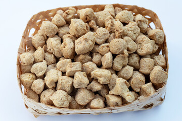 Textured soy protein on white background.
