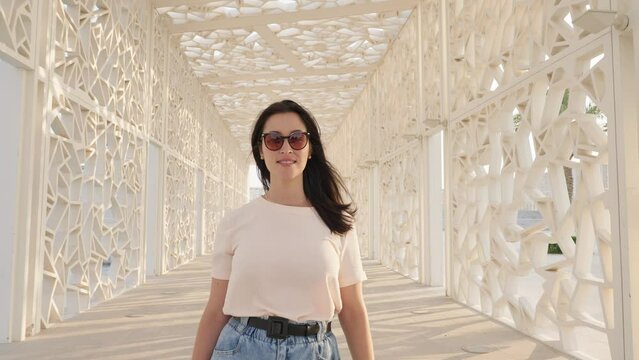woman student tourist walking at Education City building at  Doha Qatar
