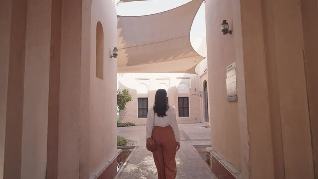  Tourist walking at Katara Cultural Village in Doha, Qatar
