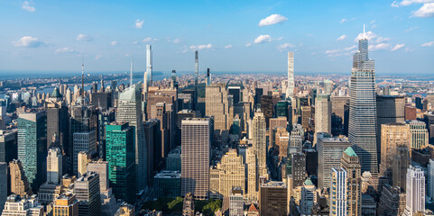 New York skyline, panoramic view with skyscrapers in Midtown Manhattan with blue sky