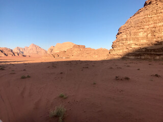 Wadi Rum, Jordan, November 2019 - A large brick building with a mountain in the desert