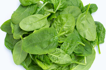Spinach leaves on white background.