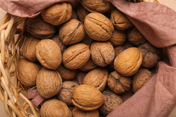 Basket with fresh walnuts, closeup