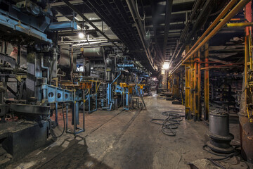 Industrial interior of an old factory for the manufacture of cast iron parts