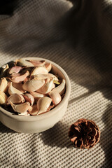 Garlic Bulb under morning sunlight on brown background. Autumn and winter tone. Concept of spices for healthy cooking.	
