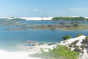 Big lagoon with boats in Lençois Maranhenses, Brazil 