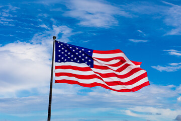 USA flag waving against sky