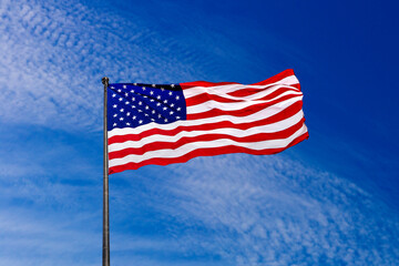 USA flag waving against sky