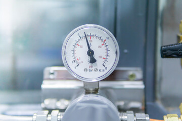 Pressure Gauge, pressure gauge on a gas regulator in a laboratory analytical equipment.