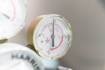 Pressure Gauge, pressure gauge on a gas regulator in a laboratory analytical equipment.