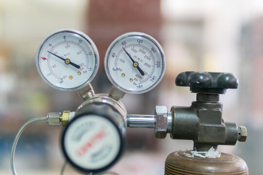 Pressure Gauge, pressure gauge on a gas regulator in a laboratory analytical equipment.