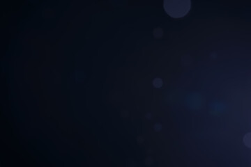 A dark blue background bokeh image for used to decorate background.