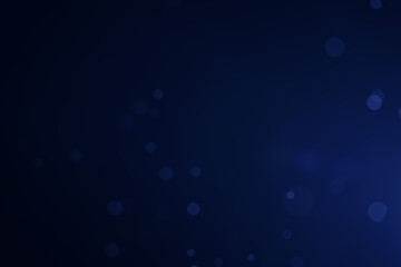 A dark blue background bokeh image for used to decorate background.