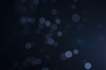 A dark blue background bokeh image for used to decorate background.