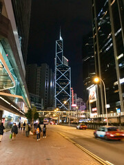 Hong Kong, China, November 2016 - A group of people walking down a street