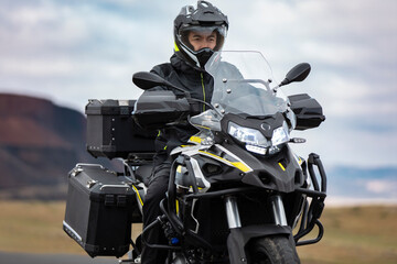 Mid adult man riding motorcycle