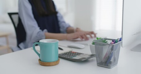 Young asia people female worker sit at table desk happy work day begin with hot caffeine herbal power boost cup. MBA lady student teen girl relax remote distant learn enjoy good time at home office.