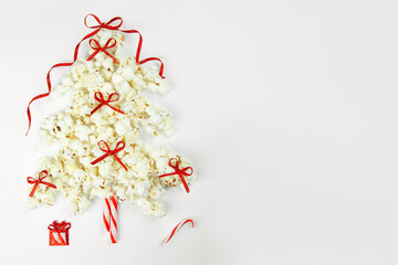Christmas tree decorations with popcorn on white