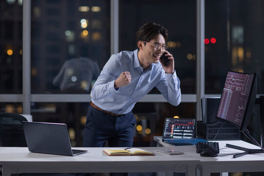 Businessman working in office at night
