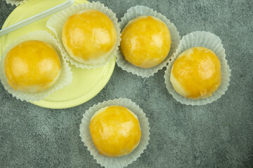 Mooncake filled sweet mung bean paste and salted egg yolk. Homemade bakery concept