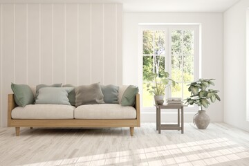 Fototapeta premium Stylish room in white color with sofa and summer landscape in window. Scandinavian interior design. 3D illustration