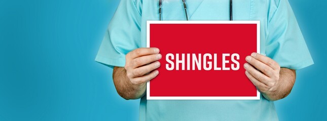Shingles (herpes zoster). Doctor shows red sign with medical word on it. Blue background.