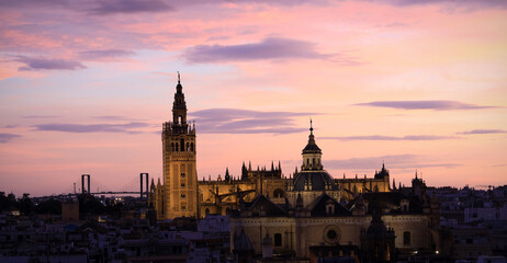 Beautiful  landscape of Sunset skyline view with a cityscape at Seville Cathedral ,Spain