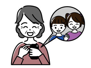 スマートフォンで孫とビデオ通話をする笑顔の高齢女性