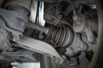Close-up of automotive CV axle rubber boots.