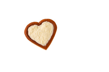 Powdered milk with nutrients in the heart shaped bowl