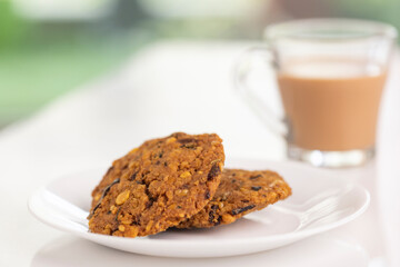 Indian Snack Peas Masal Vada, deep fried snacks food with cup of tea.