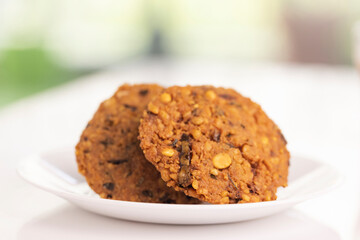 Indian Snack Peas Masal Vada, deep fried snacks food fried in oil.