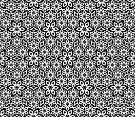 Flower geometric pattern. Seamless vector background. White and black ornament. Ornament for fabric, wallpaper, packaging. Decorative print