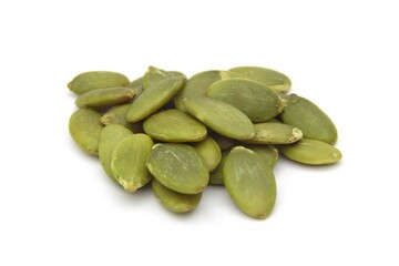 Green pumpkin seeds isolated on white background 