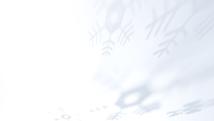 白背景に雪の結晶の影。背景素材。