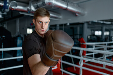 Fototapeta na wymiar Confidence man boxer do sport training boxing exercise