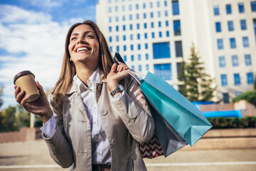 Shot of an attractive young woman going shopping in the city